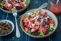 Mixed salad with beetroot, strawberries and feta
