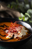 Pumpkin soup with cream and pumpkin seed oil