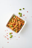 Red lentil pasta with broad beans and paprika cream