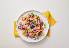 Roast beef with colourful cauliflower florets