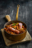 Lentil stew with salsiccia in a casserole dish