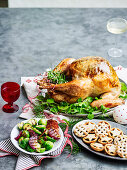 Herbed butter roast turkey with prosciutto and pear stuffing