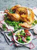 Herbed butter roast turkey with prosciutto and pear stuffing