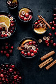 Punch with cranberries, cinnamon, orange and aniseed stars