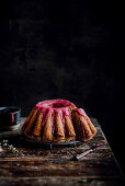 Cupcake with raspberry glaze