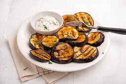 Grilled aubergine slices with herb soya dip