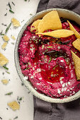 Beetroot hummus with tortilla chips