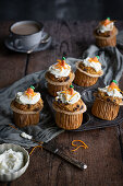 Carrot cake muffins with cream cheese icing