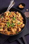 Vegan pasta with creamy peanut sauce