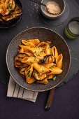 Vegan pasta with coconut-tomato sauce and grilled aubergines