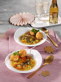 Clear lentil soup with poultry balls for New Year's Eve