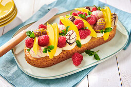 Easter cake with mascapone, raspberries and mango