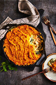 Fish curry casserole with sweet potato topping