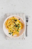 Tagliatelle with yellow roasted pepper sauce