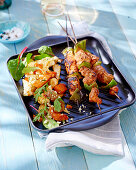 Tandoori chicken skewers with grilled vegetables