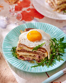 Buckwheat crêpe lasagne with cheese and fried egg