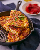 Tortilla with piquillo peppers and Serrano ham