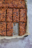 Gluten-free muesli bars made from rolled oats, nuts and seeds
