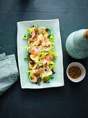 Loup de mer sashimi radish salad with chilli, soy and sesame oil dressing