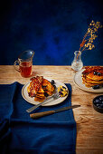 Ginger and blueberry pancakes with gochujang-glazed bacon