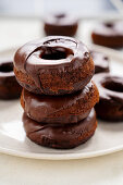 Baked chocolate donuts with chocolate icing