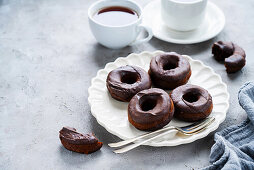 Baked chocolate donuts with chocolate icing