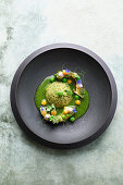 Roasted avocado with spiced kefir, pea couscous and lemon