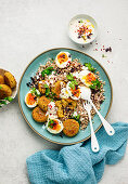 Buckwheat salad with falafel and egg