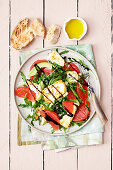 Rocket and avocado salad with halloumi and pink grapefruit