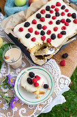 Scone cake with icing and fresh berries