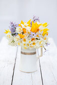 Bouquet of spring flowers in a pot, tulips (Tulipa) and hyacinths (Hyacinthus)