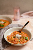 Vegetarian lasagne soup with tomato sauce and red lentils