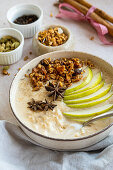 Rice pudding with pear, granola and star anise