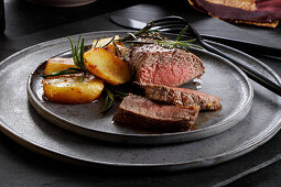 Roast beef steak with rosemary potatoes