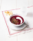 Beetroot soup with sour cream and herbs