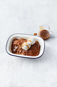 Date pudding with vanilla ice cream and caramel sauce