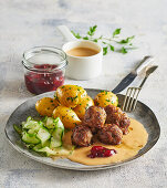 Swedish meatballs with potatoes and lingonberry jam