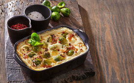 Brussels sprout gratin with bacon, parmesan and mozzarella