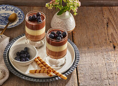 Three-layer panna cotta with blueberries