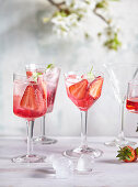 Strawberry cocktail with sparkling wine and Campari