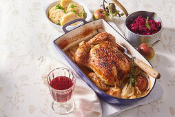 Goose-style roast chicken with apples and sauerkraut