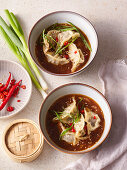 Asian lamb dumplings with spicy ginger sauce