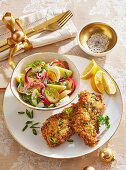 Carp in a lemon and herb crust with cucumber and onion salad