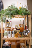 Shelf with spices and kitchen utensils