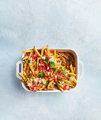 Sweet potato and chips casserole with bolognese, feta and mint