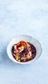 Self-saucing pudding with mulled wine and oranges