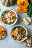 Pumpkin soup with tortellini and kale