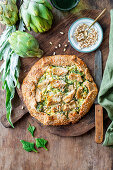 Artichoke galette with spinach and pine nuts