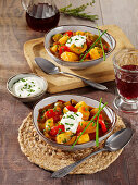 Vegetarian potato goulash with peppers and yoghurt