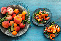 Grilled peach with glazed miso prawns and sesame spinach